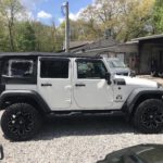 2009 Jeep Wrangler Unlimited 4dr. minor collision damage (see pictures). RUNS AND DRIVES. Good airbags. $8,999. NY907A salvage title. full